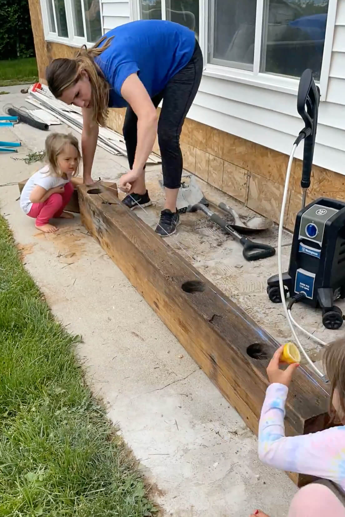 Planing an old mantle to make it thinner.